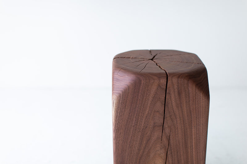 Walnut table used as a stool at dining height