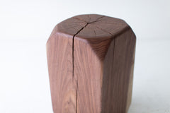 Several walnut tables grouped together as a coffee table