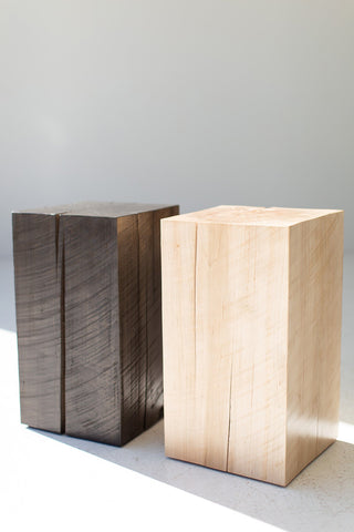 Aged and natural maple stumps side by side