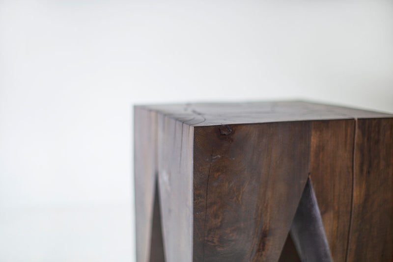 Group of Vega stump tables in varying heights styled together
