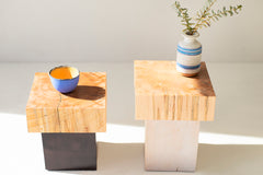 Angled view of a maple side table showing natural cracking and character