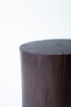 Overhead view of the stump table's round walnut top