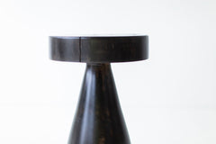 Modern luxury maple Boca Dos stool styled in a dining room
