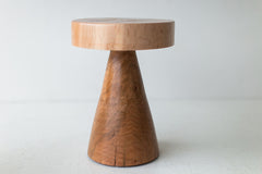 Full view of the Boca Dos stump stool against a neutral backdrop