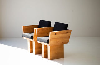 Organic modern knotty alder dining arm chair, front view
