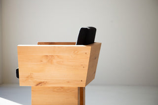 Organic modern alder dining chair in a dining room