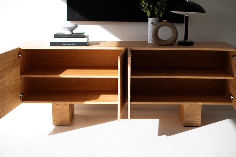 Modern luxury oak credenza styled as a media unit in a living room