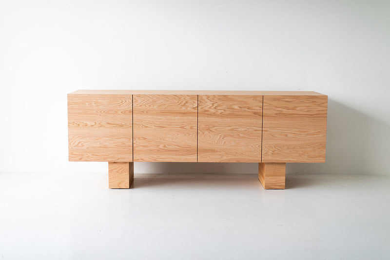 Modern Suelo oak credenza against a neutral backdrop