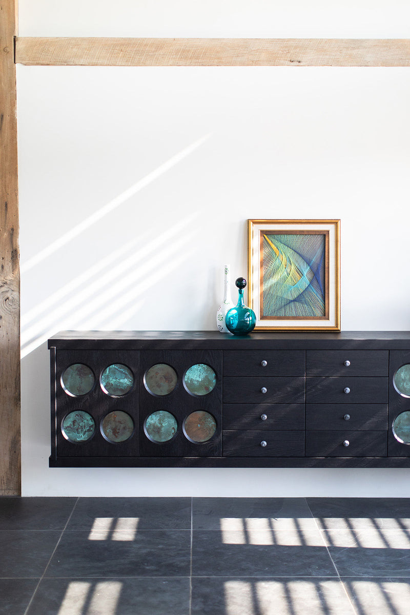 Interior of the push-to-open cabinet with adjustable shelves