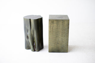 Army green red cedar stump (left) beside a square maple stump