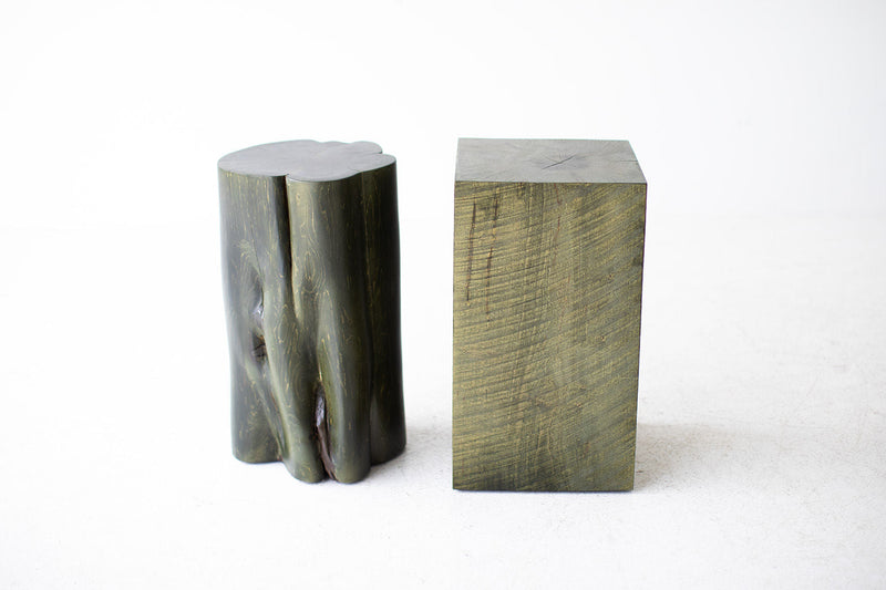 Army green red cedar stump (left) beside a square maple stump