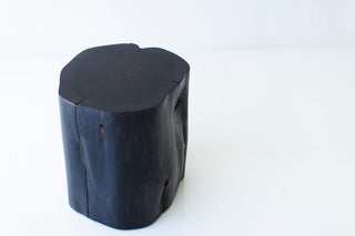 Aged finish red cedar stump shown at an angle