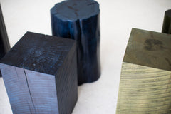 Stump table styled beside a sofa