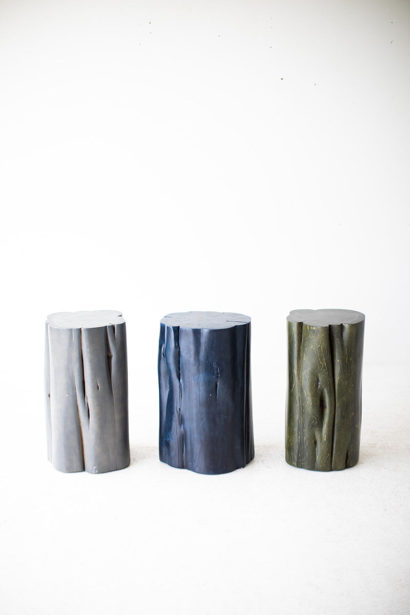 Pair of denim blue stump tables styled together