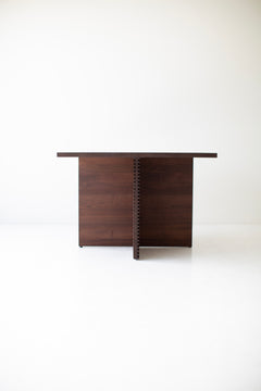 Angled view of the Cicely pedestal dining table highlighting its commercial-grade finish