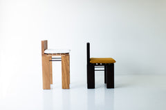 Detail of the joinery where the oak meets the metal rods