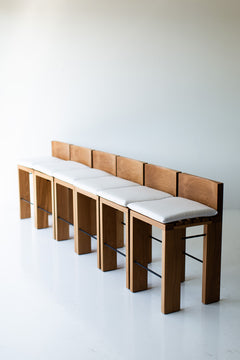 Modern luxury white oak counter stool in a bright kitchen