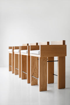 Close-up of the white oak grain and natural finish on an arm