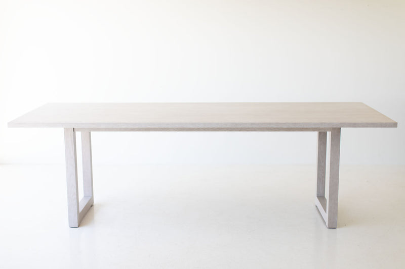 Modern luxury whitewash dining table styled with place settings