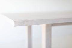 Detail of the white oak wood grain on the modern dining table