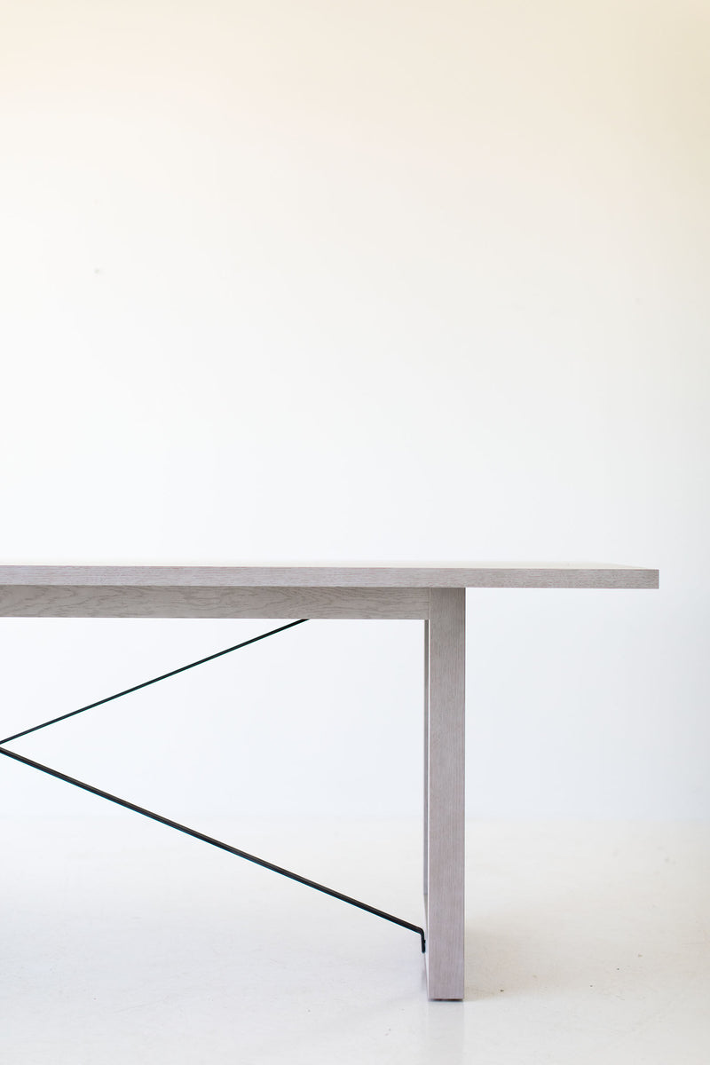 Side profile of the modern luxury whitewash white oak dining table