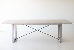 Close-up of the modern white oak table legs and base