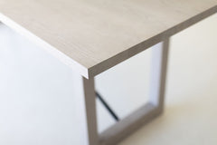 Angled view of the modern whitewash oak tabletop