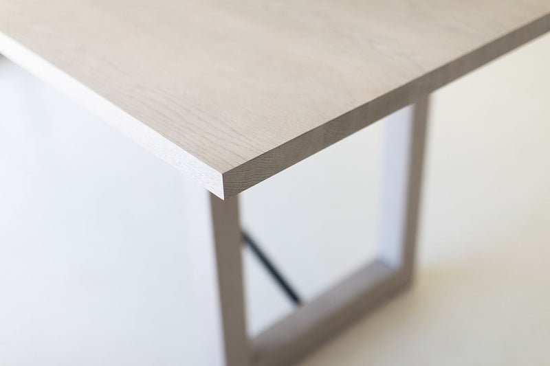 Angled view of the modern whitewash oak tabletop