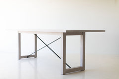 Modern whitewash white oak dining table styled in a modern dining space