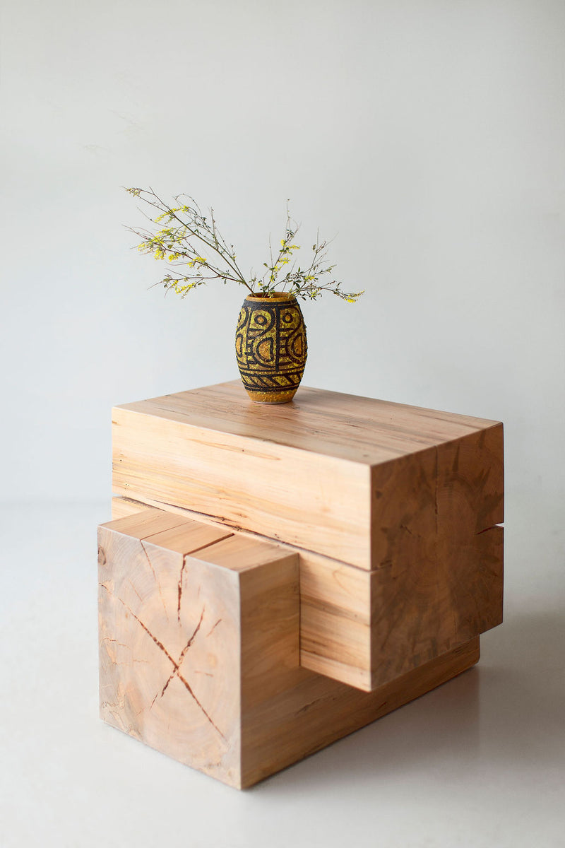 Detail shot of the hand-sawed edges on a maple stump table