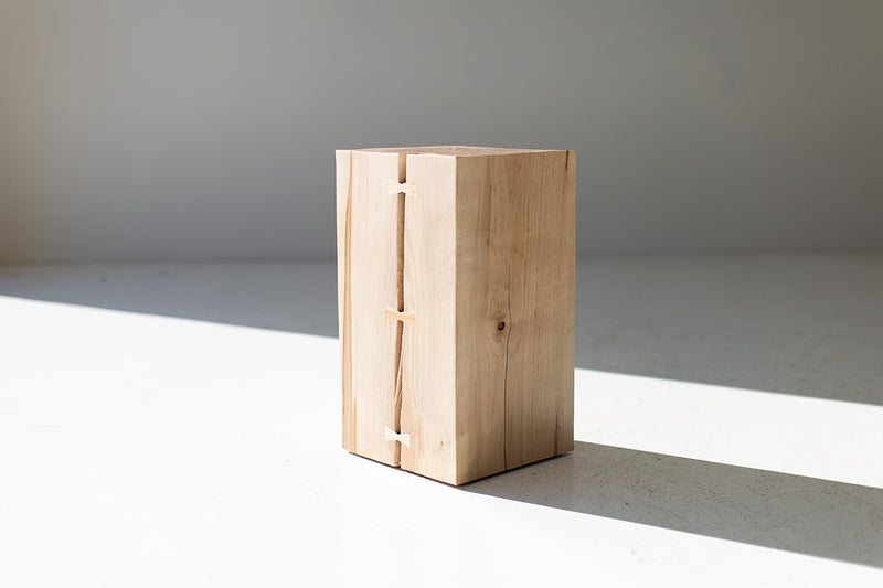 Wood side table with bowtie joinery and a natural rough cut maple finish