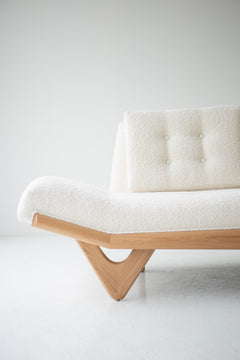 Side profile of the Alaska sofa showing its low, streamlined silhouette