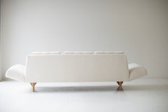 Modern luxury oak sofa styled in a modern living room
