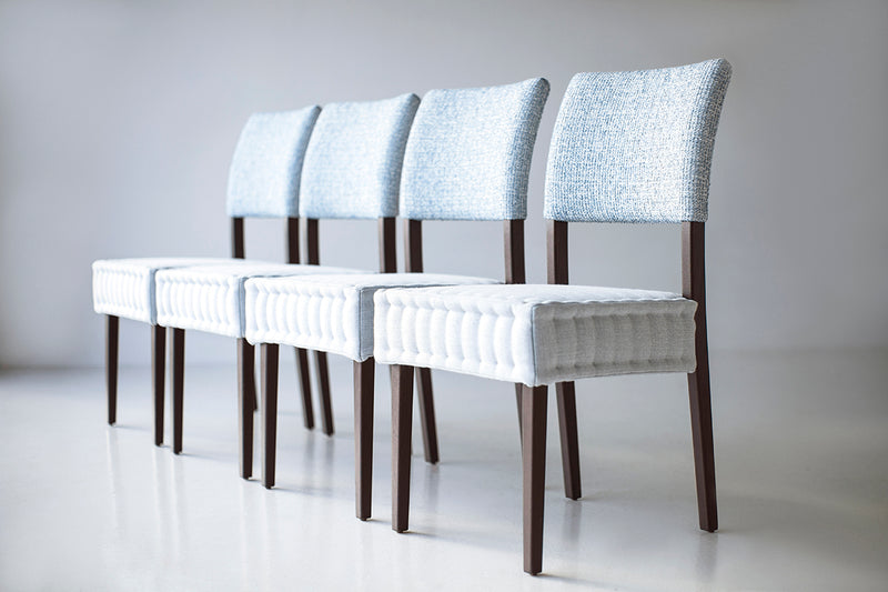 Modern quilted dining chair with hand-stitched oak frame and leather upholstery