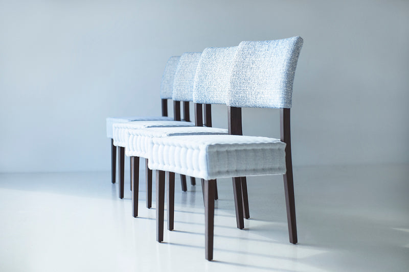 Full view of an Arceo modern quilted dining chair against a white backdrop