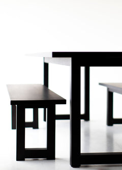 Detail of the hand-finished matte top on the modern walnut dining table