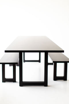 Modern luxury black walnut table styled as an oversized desk