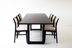 Modern luxury black walnut dining table shown from above