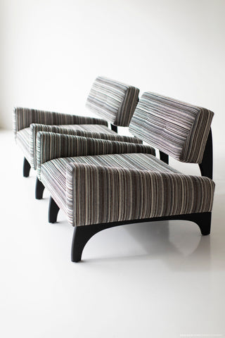 Canadian chair with dark walnut finish, pair angled in a row against a white studio backdrop