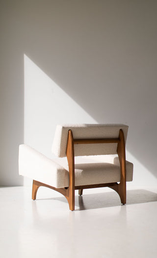 Canadian modern lounge chair in teak styled in a living room setting