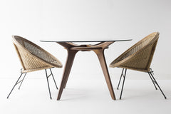 Angled view of the Craft Associates walnut dining table