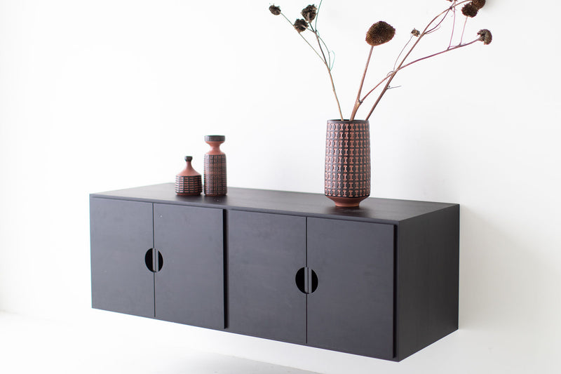 Close-up of the walnut wood grain on the modern luxury storage cabinet