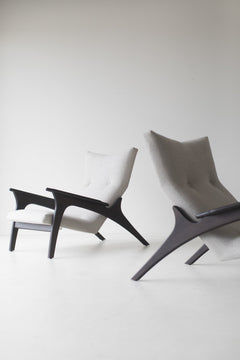Pair of Frank chairs in dark walnut styled together in profile