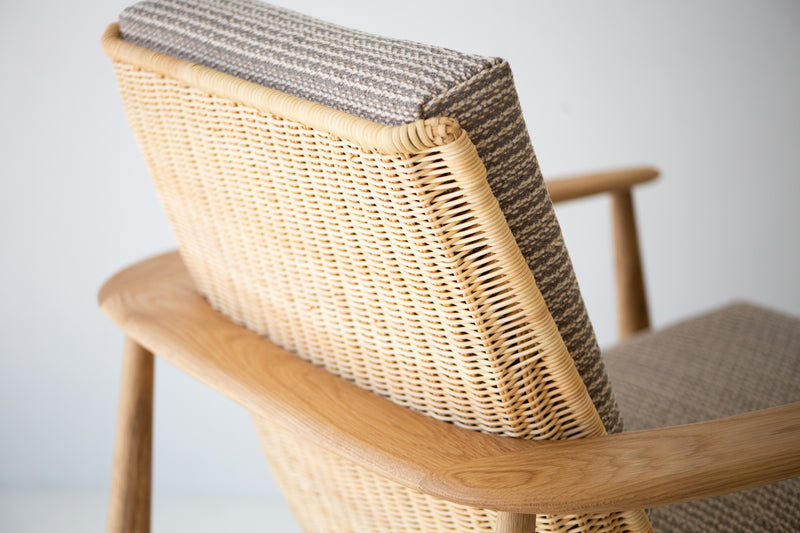 Lawrence Peabody 1806P wicker lounge chair in white oak, close-up of the wicker weave and oak arm