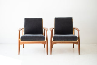 Lawrence Peabody 1806P wicker lounge chairs in matte teak, pair shown front-on with charcoal mohair cushions