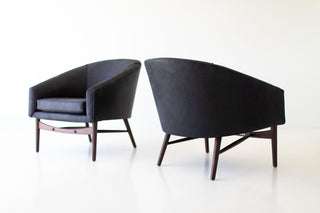 Angled view of the Peabody walnut and black leather club chair