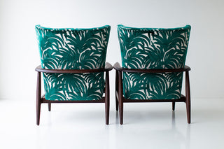 Close-up of the boucle texture and stitching on the modern wing chair