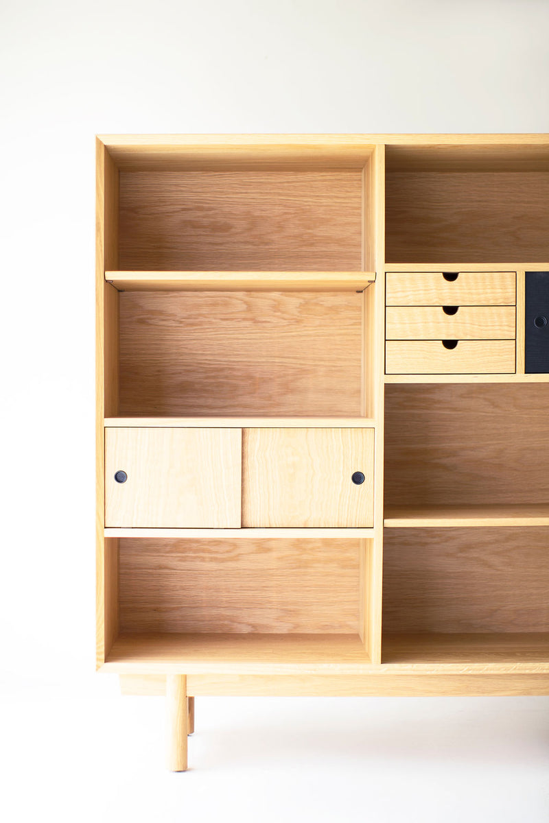 Detail of the brass pulls on the Lawrence Peabody oak bookcase