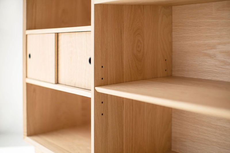 Back view of the Lawrence Peabody oak bookcase showing its solid oak construction