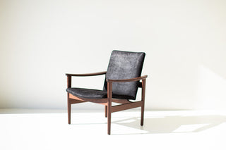 Walnut Lawrence Peabody 2360P occasional chair with black upholstered seat and back, angled from the front left